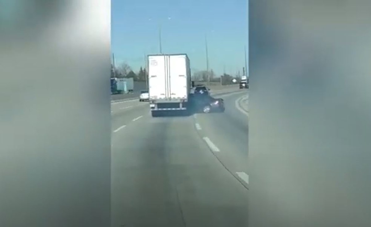 Semi-Truck Drags Car Pinned Underneath it on Illinois Interstate