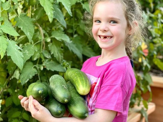 dad-and-daughter-duo-gardening-food